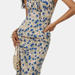 Arisha – Knotted Irregular Hem Floral Long Dress in Blue